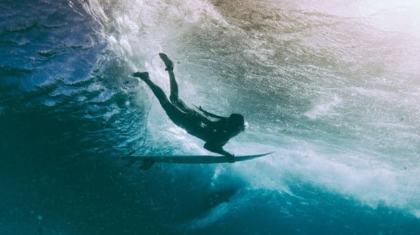 Surfer riding a big wave